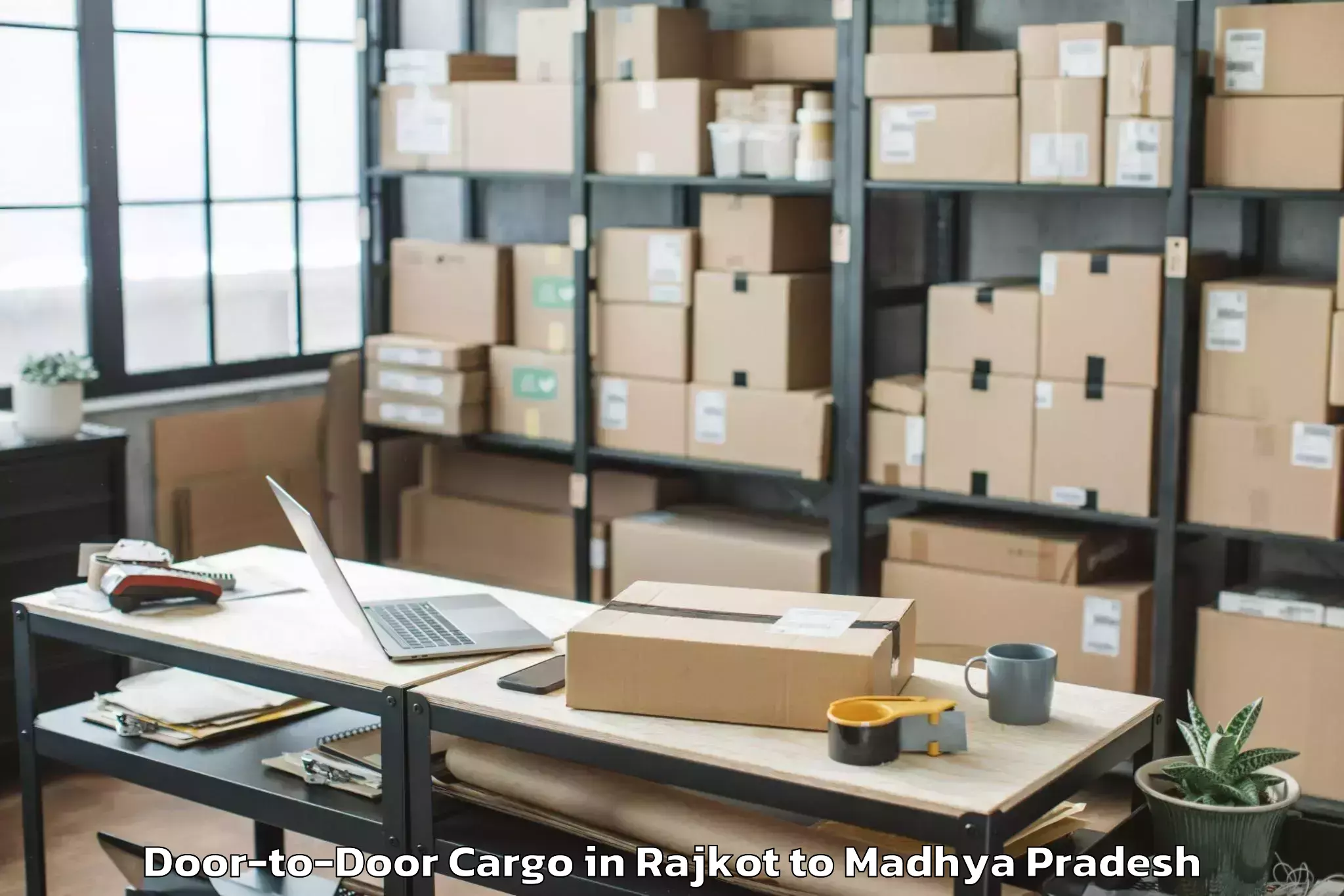 Easy Rajkot to Niwari Door To Door Cargo Booking